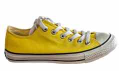 黄色的运动鞋时尚古董孤立的白色背景