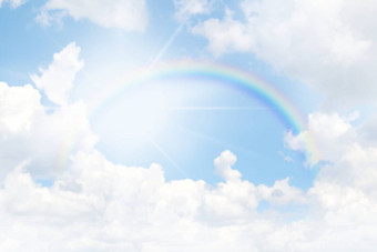 彩虹天空蓝色的太阳光发光背景彩虹环圆天空色彩斑斓的彩虹天空