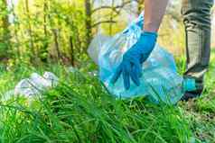 全球污染地球塑料浪费志愿者生态清算森林梅多斯收集浪费