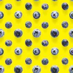 时尚的无缝的模式蓝莓蓝莓模式孤立的黄色的背景