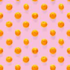 新鲜的普通话接缝模式成熟的水果橘子无缝的模式新鲜的柑橘类孤立的粉红色的背景模式平躺克莱门泰