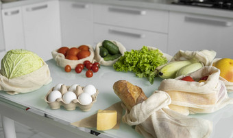 蔬菜水果鸡蛋可重用的生态棉花袋表格浪费购物概念塑料免费的项目多用途的重用回收生态友好的帆布杂货店袋西红柿胡椒面包