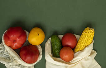 蔬菜生态袋绿色表面复制空间胡椒番茄玉米黄瓜西兰花菜花可重用的购物生态友好的棉花织物袋浪费塑料免费的概念