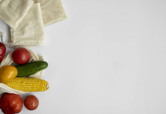 群混合有机蔬菜空可重用的棉花袋表格浪费概念生态友好的生活方式概念食品杂货生态袋塑料免费的项目重用减少回收