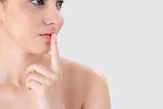 美年轻的亚洲女人手势手指口显示嘘安静的秘密皮肤护理脸孤立的白色背景美丽的女护肤品健康面部