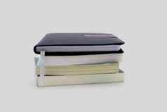 堆栈书孤立的白色背景笔记本教科书堆文具请注意学习研究堆日记文学教育业务集合概念