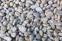 石头鹅卵石背景纹理海滩石头模式背景
