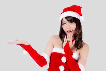 美丽的肖像年轻的亚洲女人圣诞老人服装<strong>展示</strong>空砰砰砰快乐假期圣诞节美模型亚洲女孩快乐的惊<strong>喜庆</strong>祝圣诞节孤立的白色背景