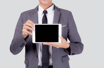 肖像年轻的亚洲业务男人。显示展示平板电脑电脑空白成功孤立的白色背景商人站持有触控板数字沟通概念