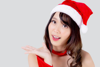 美丽的肖像年轻的亚洲女人圣诞老人服装展示空砰砰砰快乐假期圣诞节美模型亚洲女孩快乐的惊喜庆祝圣诞节孤立的白色背景