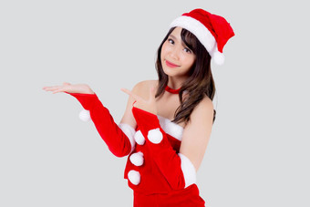 美丽的肖像年轻的亚洲女人圣诞老人<strong>服装展示</strong>空砰砰砰快乐假期圣诞节美模型亚洲女孩快乐的惊喜庆祝圣诞节孤立的白色背景