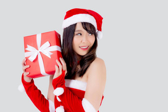 美丽的肖像年轻的亚洲女人快乐持有红色的礼物盒子兴奋<strong>圣诞</strong>节假期孤立的白色背景亚洲女孩惊<strong>喜庆</strong>祝节日<strong>圣诞</strong>节一年