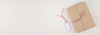 礼物盒子卡夫纸标签标签木表格圣诞节一天假期现在盒子周年纪念日庆祝活动复制空间庆祝节日平躺横幅网站