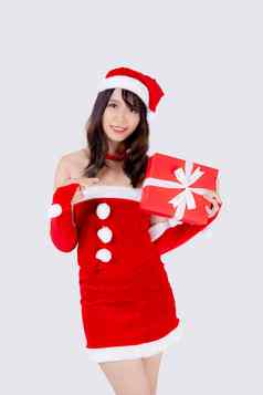 美丽的肖像年轻的亚洲女人快乐持有红色的礼物盒子兴奋圣诞节假期孤立的白色背景亚洲女孩惊喜庆祝节日圣诞节一年