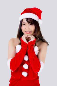 美丽的肖像年轻的亚洲女人圣诞老人服装穿他微笑手势心手假期圣诞节美模型亚洲女孩快乐的庆祝圣诞节孤立的白色背景