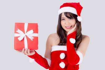 美丽的肖像年轻的亚洲女人快乐持有<strong>红色</strong>的礼物盒子兴奋圣诞节假期孤立的白色背景亚洲女孩惊<strong>喜庆</strong>祝节日圣诞节一年