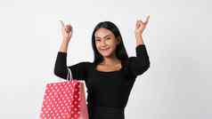 快乐购物概念年轻的亚洲泰国女人行动活动采购货物