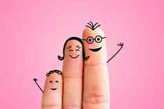 手指家庭概念快乐的手指家庭微笑粉红色的背景