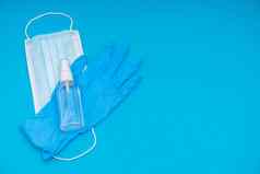 受欢迎的医疗抗病毒面具注射器病毒疫苗防腐剂洗手液蓝色的背景集至关重要的项目病毒流感大流行