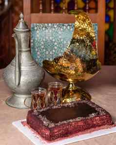 阿拉伯语茶壶玻璃蛋糕关闭