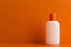 防晒霜奶油乳液橙色帽橙色背景复制空间概念防晒霜产品