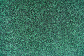 猎人绿色颜色瓦屋顶纹理背景屋面材料密集的粗糙的黑暗绿色颗粒表面瓦屋顶纹理背景瓦屋顶使沥青塑料玻璃纤维