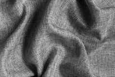 灰色的变形织物背景大折叠