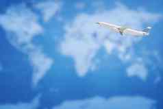 商业飞机飞行世界地图优雅的设计复制空间业务运输旅行概念