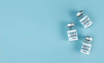 医学瓶科维德<strong>疫苗</strong>蓝色的背景复制空间