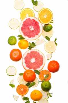 柑橘类背景新鲜的柑橘类水果柠檬橙子酸橙葡萄柚白色背景