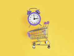 超市电车紫罗兰色的报警时钟黄色的背景买时间忙概念