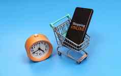 购物车智能手机时钟在线购物概念