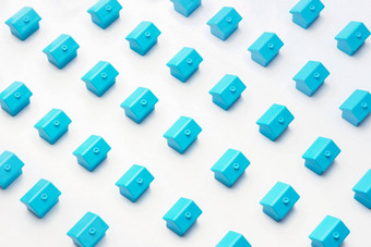 真正的房地产财产市场小屋首页摘要模型村城市区建设社区模式蓝色的微型小玩具房子站行白色最小的设计
