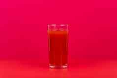 玻璃番茄汁红色的表格粉红色的背景复制空间概念素食主义者食物健康的吃
