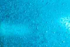 空气泡沫蓝色的洗发水背景