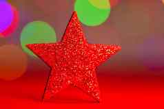 红色的闪光的装饰色彩斑斓的圣诞节作文孤立的背景模糊灯