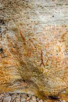 古老的土著居民的艺术手打印动物牛群螺旋澳大利亚