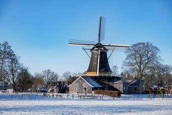佩尔莫伦有霍斯特赖森覆盖<strong>雪景</strong>观上艾瑟尔省荷兰历史风机冬天<strong>白色</strong>景观