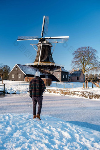 佩尔莫伦有霍斯特赖森覆盖<strong>雪景</strong>观上艾瑟尔省荷兰历史风机冬天<strong>白色</strong>景观