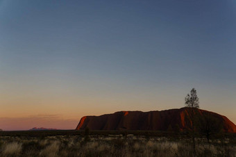 日出乌奴奴艾尔斯岩石红色的中心澳大利亚澳大利亚