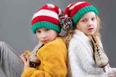 美丽的女孩男孩针织圣诞节帽子