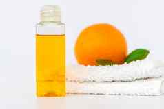 橙色石油身体橙色毛巾白色背景有机水疗中心化妆品Herbal成分