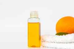 橙色石油身体橙色毛巾白色背景有机水疗中心化妆品Herbal成分
