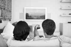 黑色的白色照片夫妇看电视封锁