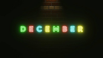 12月文本霓虹灯光色彩斑斓的砖墙纹理插图呈现霓虹灯象征12月霓虹灯光效果文本墙砖纹理简单的优雅的