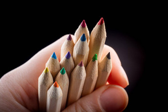 手持有彩色的铅笔有创意的的想法概念