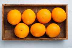 佛罗里达县橙色健康的水果木盒子白色石头背景前视图平躺