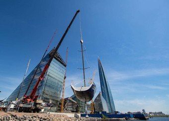 俄罗斯彼得堡港口赫拉克勒斯大工业起重机电梯<strong>帆船</strong>浮点数开始季节航行摩天大楼背景<strong>帆船</strong>毫无根据的