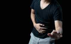 男人。腹部疼痛照片大肠身体胃痛腹泻症状月经期抽筋食物中毒健康护理概念