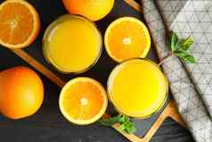 切割董事会橙色汁薄荷橙子厨房毛巾木背景前视图新鲜的饮料水果
